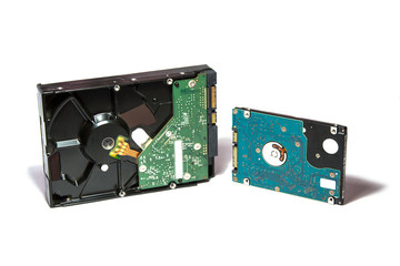 Laptop Hard disk 2.5 inch and PC Hard disk 3.5 on white background.