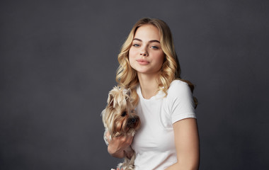 portrait of young woman with dog