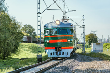 Obraz premium Retro passenger train moves from Moscow to Mytischi. This type of the trains was made in Riga in 1964-1970 yy.
