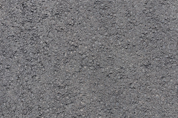 Texture of fresh pavement or asphalt lined up close. Flat lay.