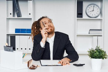 businesswoman talking on phone in office