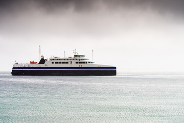Fjord with ferry boat, Norway.
