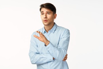 portrait of young man with arms crossed