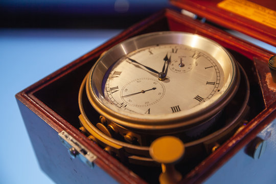 Vintage naval clock in wooden box
