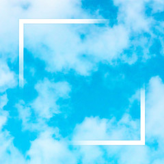 Abstract square design template for a quote, blue sky background with white clouds and a square frame, a texture with copy space