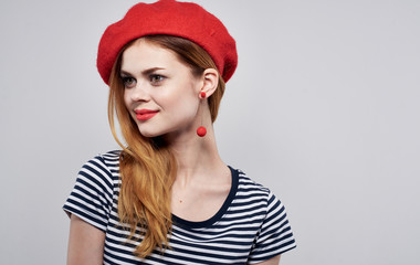 portrait of young woman in red hat