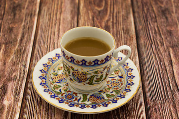a Cup of Turkish coffee on a wooden table