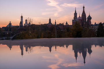 Fototapeta na wymiar Silhouettes of the Moscow Kremlin at sunset , view from Zaryadye Park