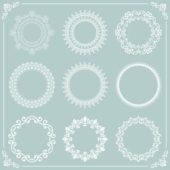 Vintage set of vector round white elements. Different elements for design frames, cards, menus, backgrounds and monograms. Classic patterns. Set of vintage patterns