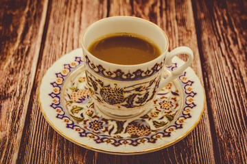 a Cup of Turkish coffee on a wooden table