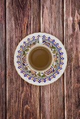 a Cup of Turkish coffee on a wooden table