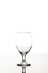 empty transparent glass on table isolated on white