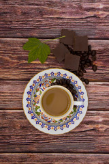 a Cup of Turkish coffee on a wooden table