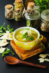 Fresh split pea soup with crackers and herbs