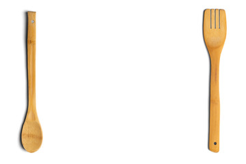 Wooden spoon and fork. Isolated on white background. Top view.