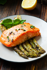 Healthy food - peace of salmon, backed with asparagus