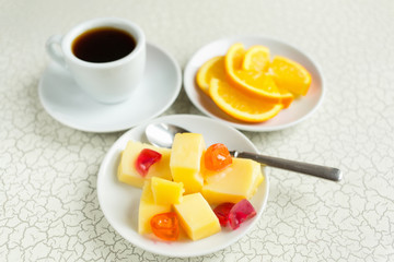 Milk pudding and fruit candy for dessert. Coffee and orange slices for breakfast.
