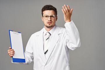 doctor with thumbs up gesture isolated on white