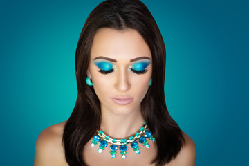 woman with massive blue accessory