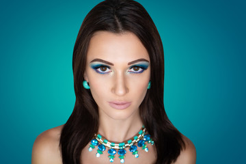 woman with massive blue accessory