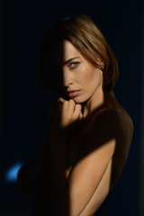 Fototapeta premium Studio portrait of a beautiful young woman