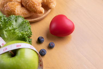 tape measure and water and diet food, weight loss and detox concept.