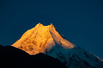 Manaslu, the eighth highest mountain in the world at 8,163 metres above sea level. It is located in the Mansiri Himal, part of the Nepalese Himalayas, in the west-central part of Nepal.