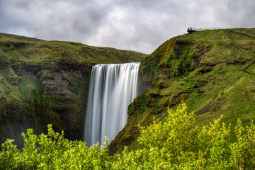 Fototapeta premium Long exposure photograph of skogafoss waterfall in spring