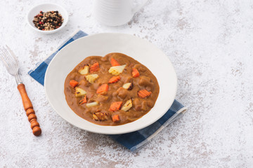 Curry with potato and carrot Japan food background