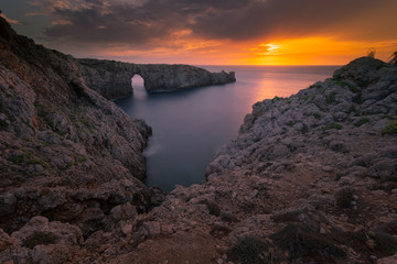 Fototapeta na wymiar Famous Pont d'en Gil at the west coast of Menorca, Balearic Islands, Spain.