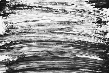 Abstract gouache paint strokes in black and white painting for backgrounds