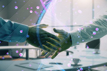 Multi exposure of DNA icon hologram on office background with two men handshake. Concept of...
