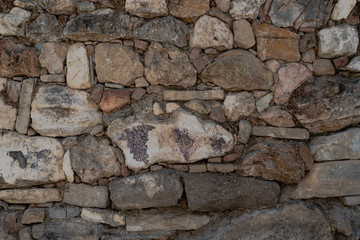 old stone wall of stones