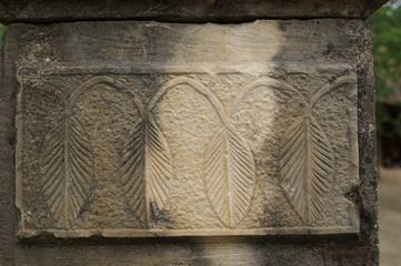 a fragment of an ornament carved in stone