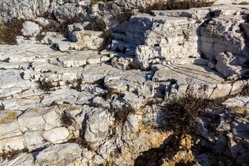 Rocky canyon beach with blue sea