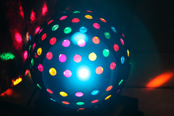 Disco ball in front of black background