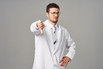 young man with thumbs up gesture isolated on white