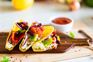 Tacos on cutting board