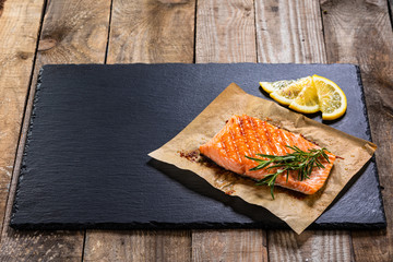Roast salmon on stone plate