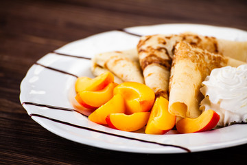 Sweet crepes with apricots