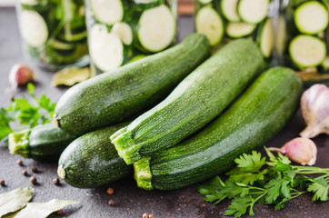 Fresh organic zucchini, garlic and parsley, herbs and spices.