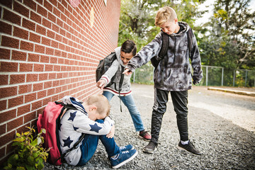 sad intimidation moment Elementary Age Bullying in Schoolyard