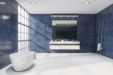 Fototapeta na wymiar Luxury blue bathroom interior with tub and sink