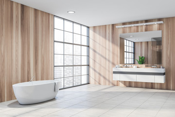 Fototapeta na wymiar Luxury wooden bathroom corner with tub and sink