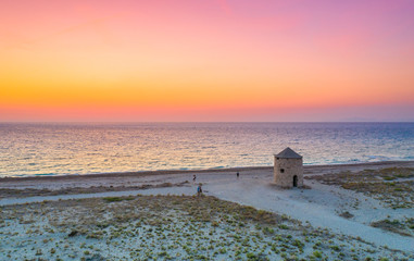 Famous Gyra beach with old windmills in Lefkada island, Greece.