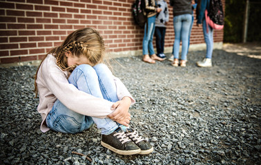 sad intimidation moment Elementary Age Bullying in Schoolyard