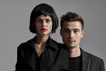 portrait of young man and woman