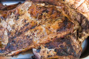 Obraz na płótnie Canvas Cooking pork ribs on a grill. Meat on a grills.