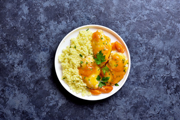 Chicken breasts in apricot sauce and couscous