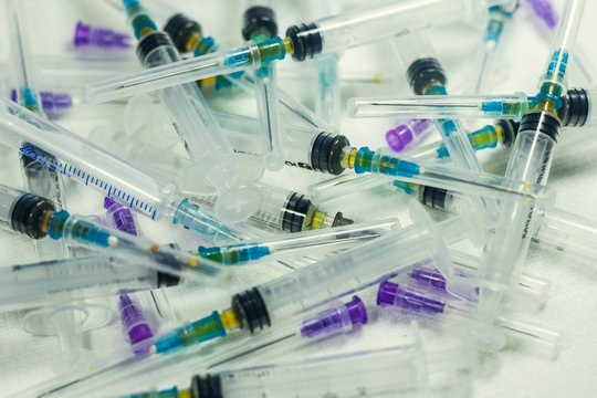 Syringe with needle, used syringes